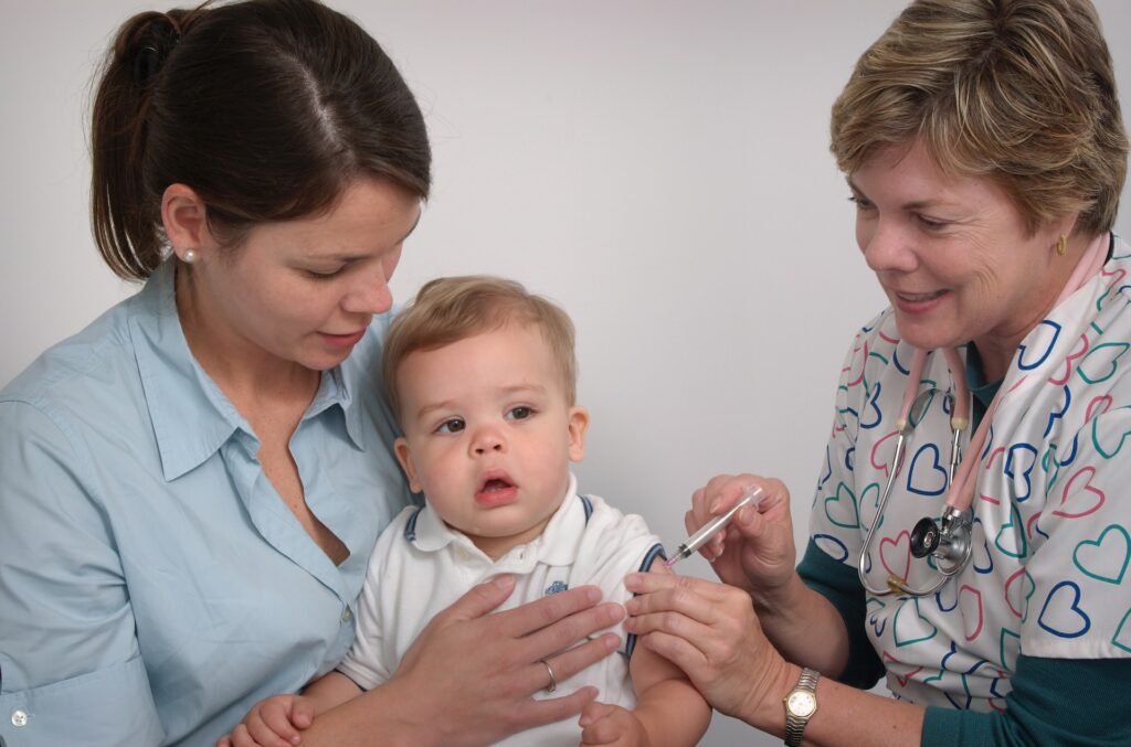 Infant getting a shot