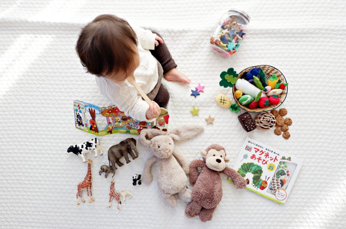 Toddler playing with toys