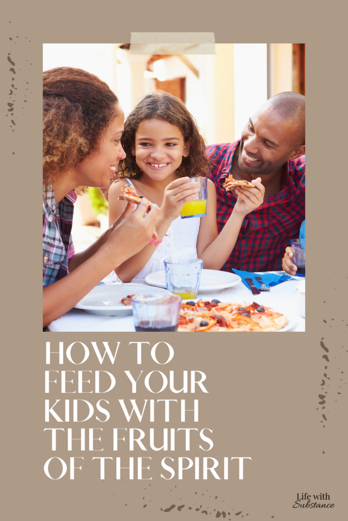 Family eating discussing how to feed your kids using the fruits of the Spirit 