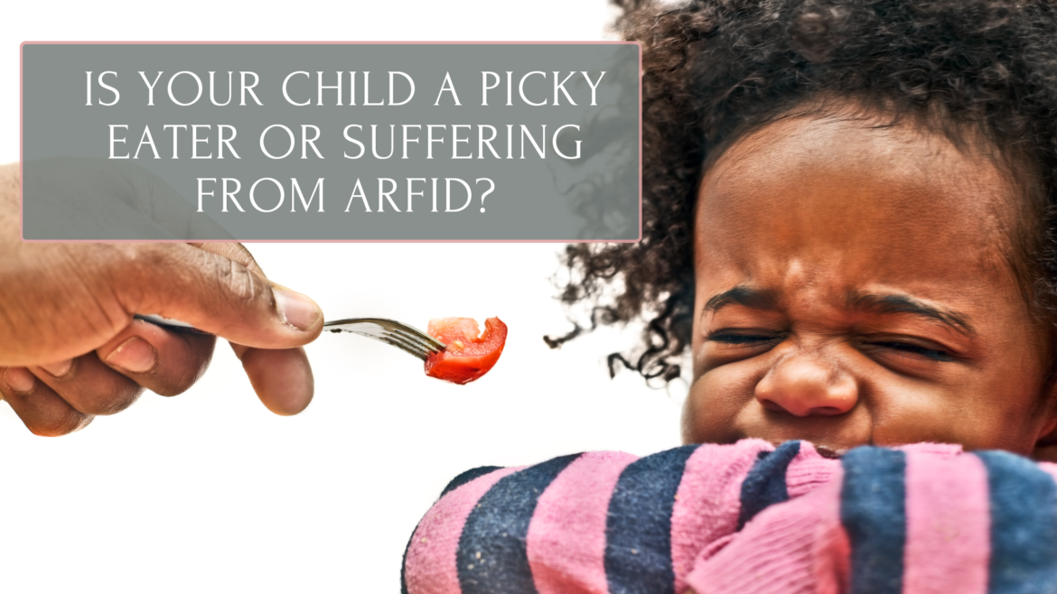 Child refusing to eat a tomato