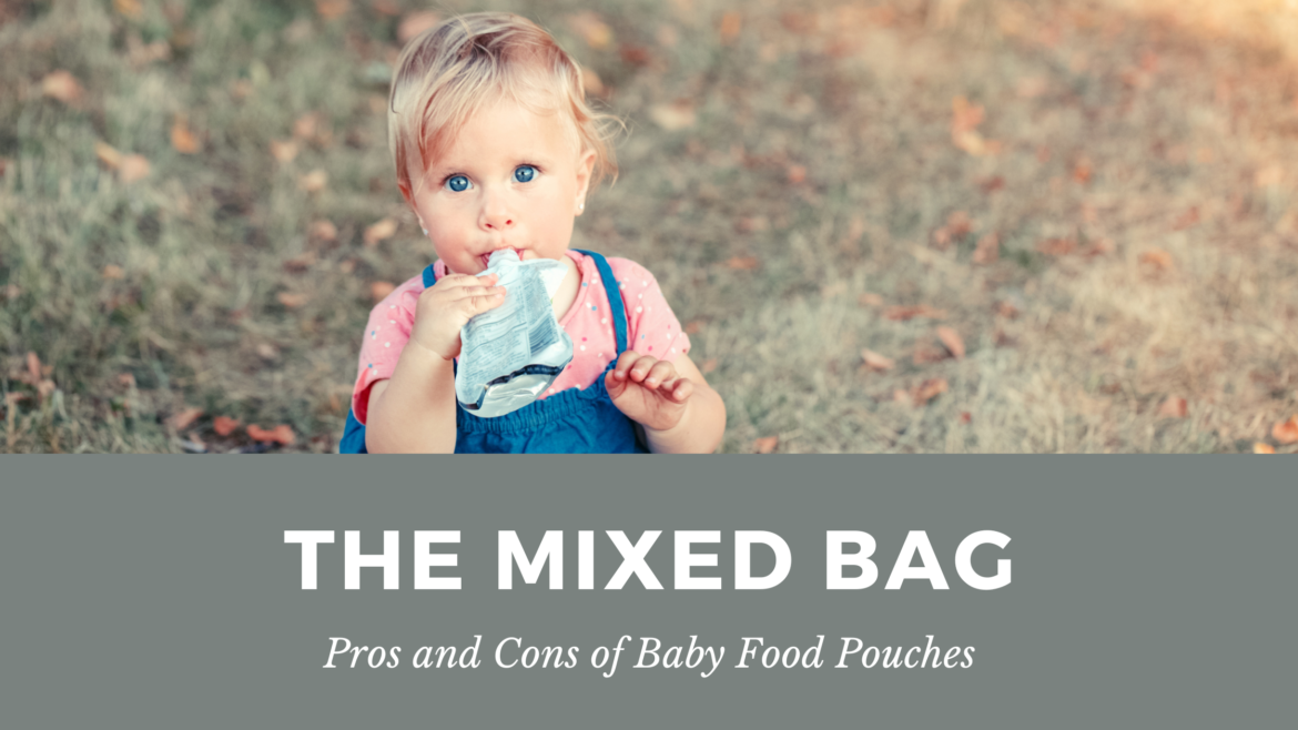 Toddler eating baby food pouch